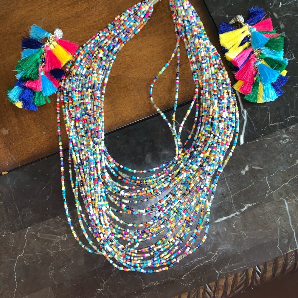 Necklace and tassel earrings with rhinestones